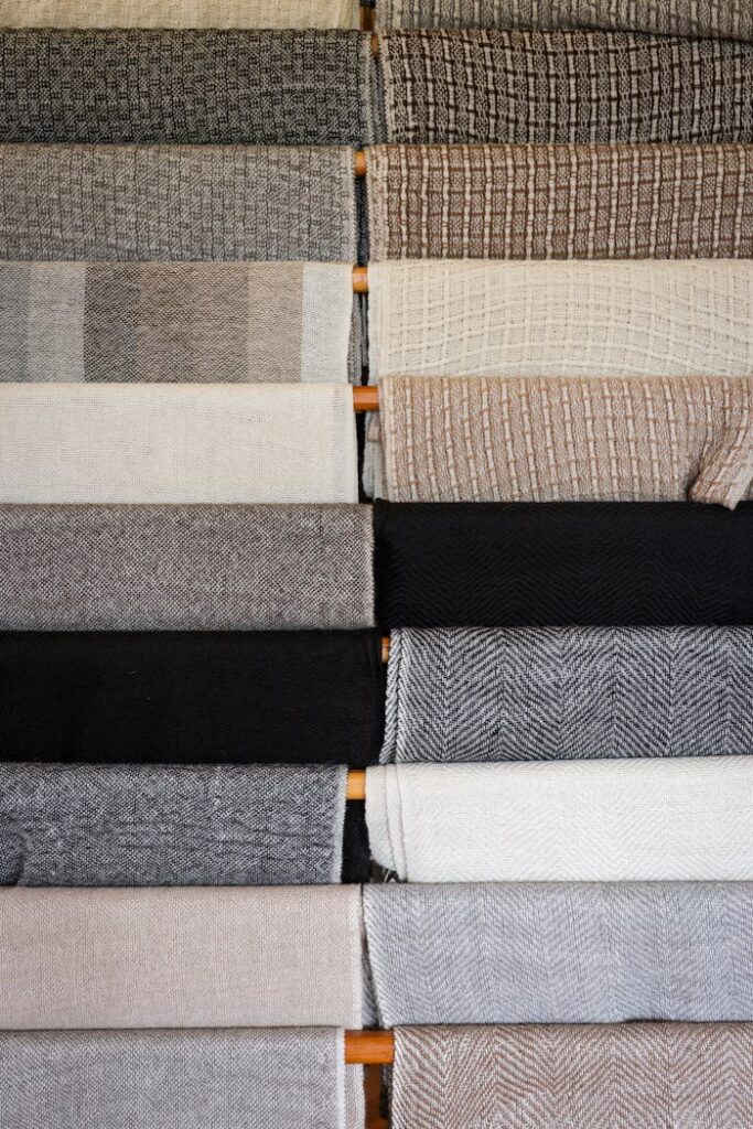 Mastering the First Impression: Your intriguing post title goes here An assortment of layered fabrics showcasing diverse textures and neutral colors, ideal for textile inspiration.